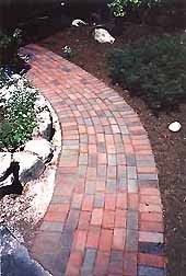Traditional brick paving in a herringbone pattern