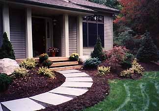 Curved walkway following the natural contour of the yard
