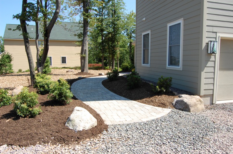 Spacious paver patio with outdoor dining area
