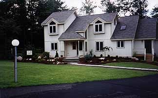 Multi-season landscape design with evergreen accents